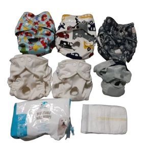 6 cloth diapers for small male dogs plus a few disposables.